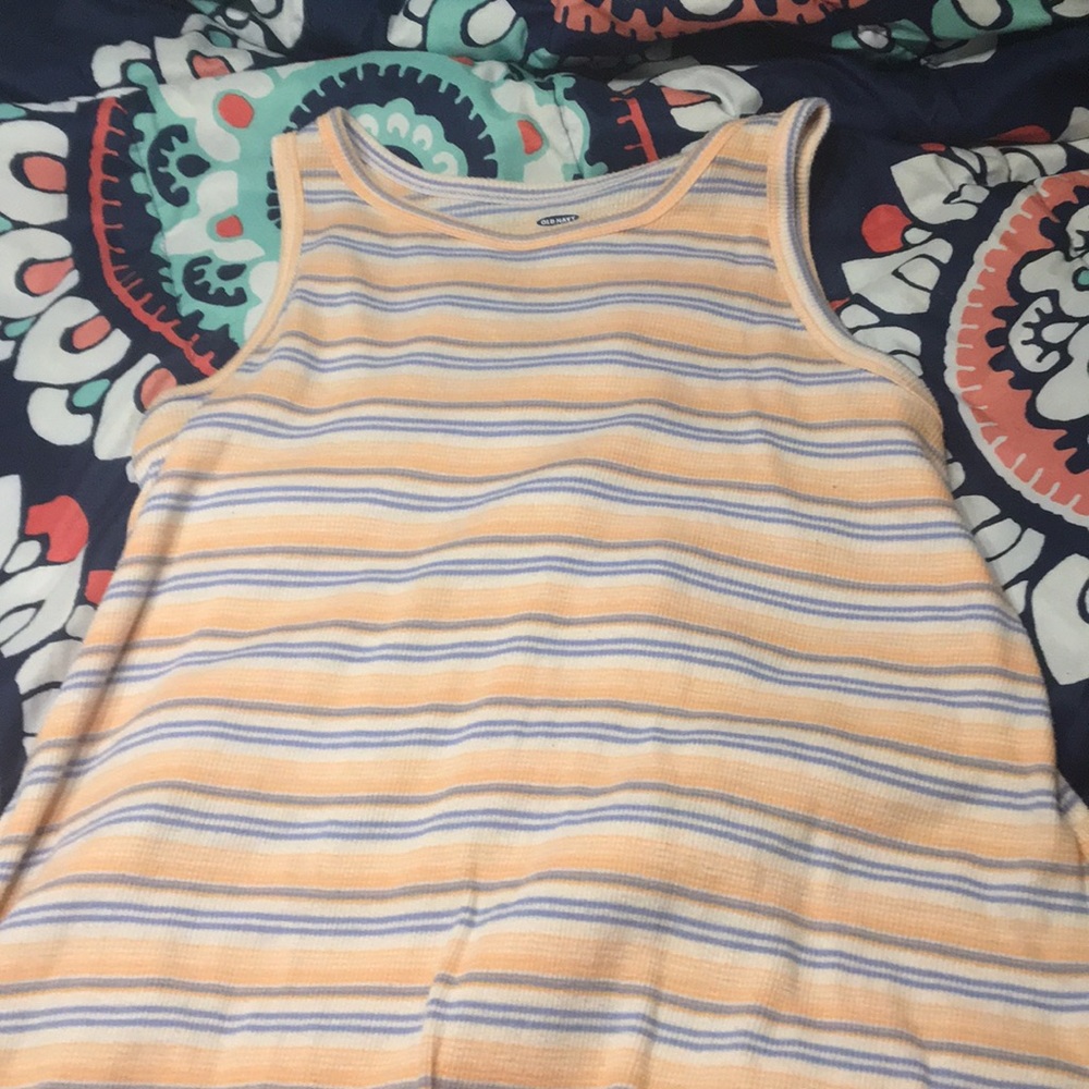 A orange, white, and purple tanktop